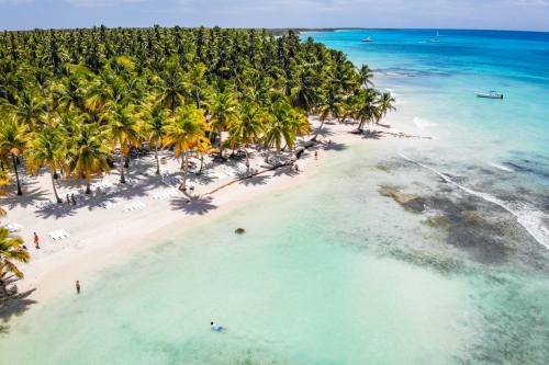 Crédito da foto: Foto de Marc Coenen: https://www.pexels.com/pt-br/foto/pessoas-na-praia-3675435/ Punta Cana